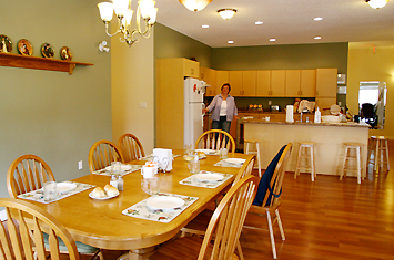 We offer a spacious kitchen with an open and friendly dining area!